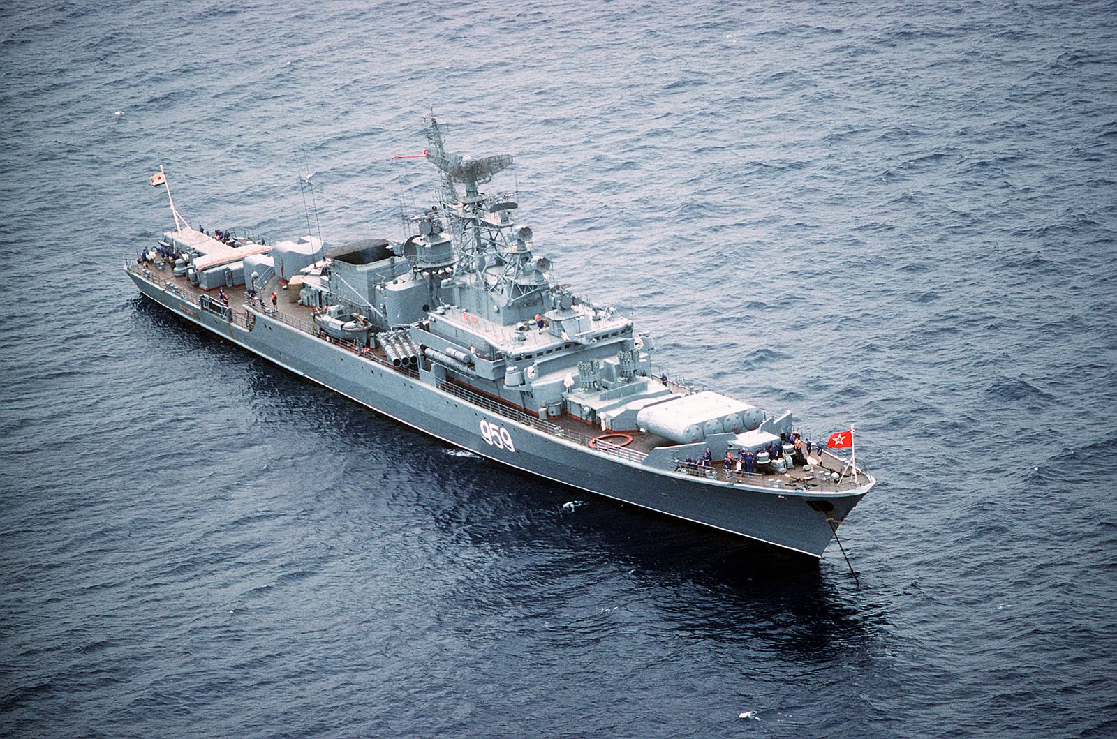 An aerial starboard bow view of the Soviet Krivak I Class guided missile frigate 959 at anchor.