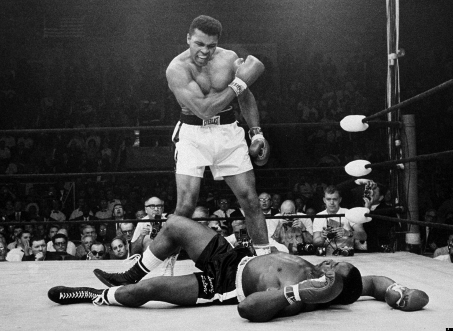 FILE - In this May 25, 1965, file photo, heavyweight champion Muhammad Ali stands over fallen challenger Sonny Liston, after dropping Liston with a short hard right to the jaw in Lewiston, Maine. Ali turns 70 on Jan. 17, 2012.(AP Photo/John Rooney, File)